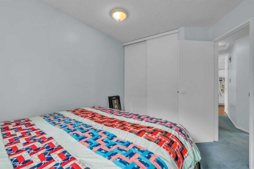 218 Pinemeadow Road Ne, Calgary, AB - Indoor Photo Showing Bedroom