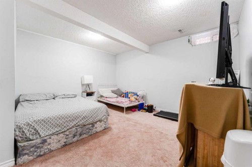 119 Falton Way Ne, Calgary, AB - Indoor Photo Showing Bedroom