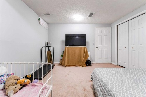 119 Falton Way Ne, Calgary, AB - Indoor Photo Showing Bedroom