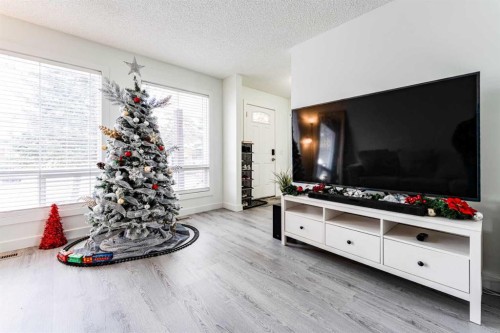 119 Falton Way Ne, Calgary, AB - Indoor Photo Showing Living Room