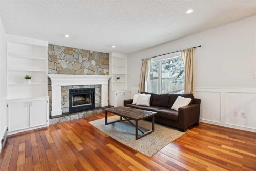 2208 Sirocco Drive Sw, Calgary, AB - Indoor Photo Showing Living Room With Fireplace