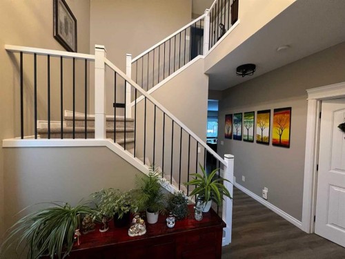 2117 Reunion Boulevard Nw, Airdrie, AB - Indoor Photo Showing Living Room With Fireplace