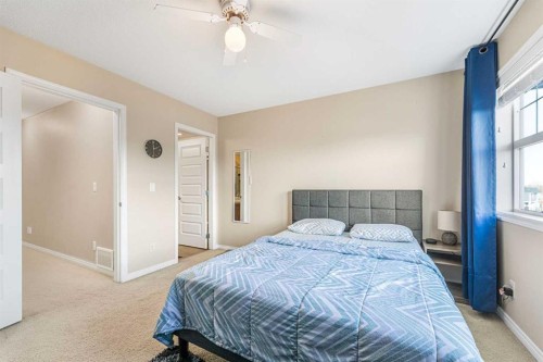 504-1086 Williamstown Boulevard, Airdrie, AB - Indoor Photo Showing Bedroom