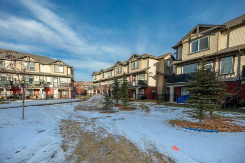 504-1086 Williamstown Boulevard, Airdrie, AB - Outdoor With Facade