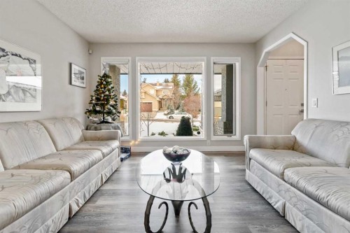 5945 Signal Ridge Heights Sw, Calgary, AB - Indoor Photo Showing Living Room