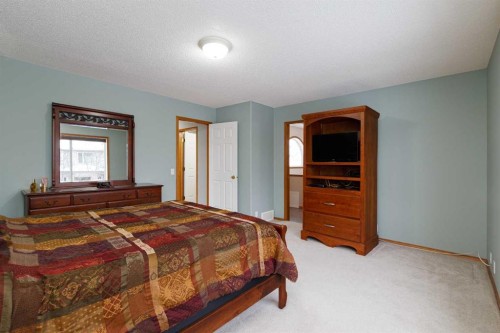 247 Mt Selkirk Close Se, Calgary, AB - Indoor Photo Showing Bedroom