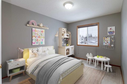 247 Mt Selkirk Close Se, Calgary, AB - Indoor Photo Showing Bedroom