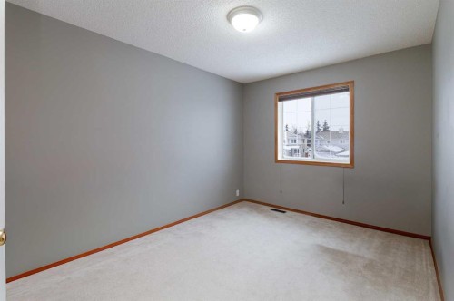 247 Mt Selkirk Close Se, Calgary, AB - Indoor Photo Showing Other Room