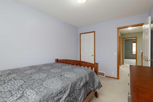 247 Mt Selkirk Close Se, Calgary, AB - Indoor Photo Showing Bedroom