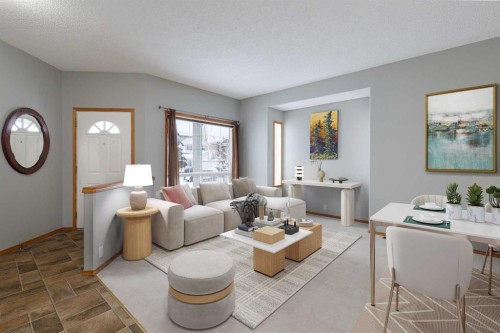247 Mt Selkirk Close Se, Calgary, AB - Indoor Photo Showing Living Room
