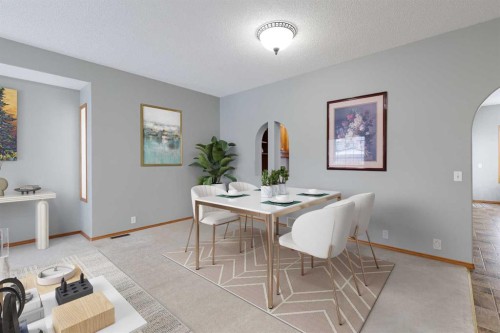247 Mt Selkirk Close Se, Calgary, AB - Indoor Photo Showing Dining Room