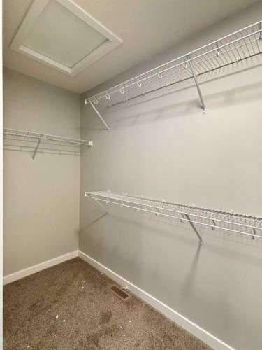 342 Baywater Common Sw, Airdrie, AB - Indoor With Storage