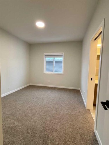 2762 Baywater Landing, Airdrie, AB - Indoor Photo Showing Other Room