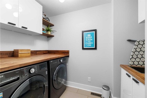 13 Royal Birch Park Nw, Calgary, AB - Indoor Photo Showing Laundry Room