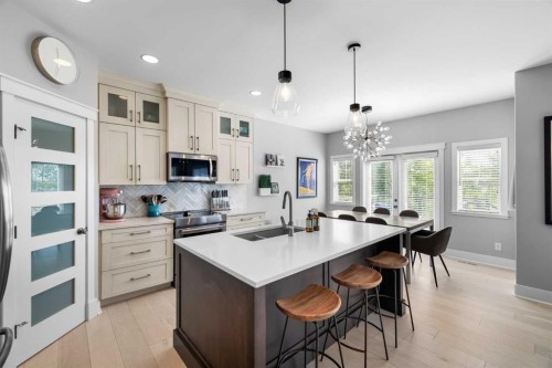 13 Royal Birch Park Nw, Calgary, AB - Indoor Photo Showing Kitchen With Double Sink With Upgraded Kitchen