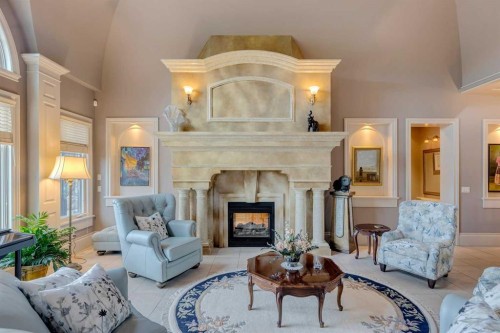 124 Misty Morning Drive, Rural Rocky View County, AB - Indoor Photo Showing Living Room With Fireplace