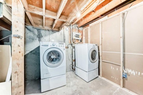 6791 Malvern Road Ne, Calgary, AB - Indoor Photo Showing Laundry Room