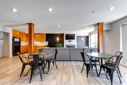 106-35 Richard Court Sw, Calgary, AB - Indoor Photo Showing Dining Room