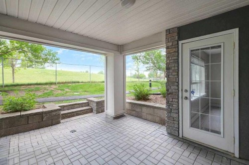 106-35 Richard Court Sw, Calgary, AB - Outdoor With Deck Patio Veranda With Exterior
