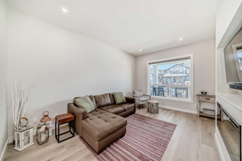 934 Cobblemore Common Sw, Airdrie, AB - Indoor Photo Showing Living Room