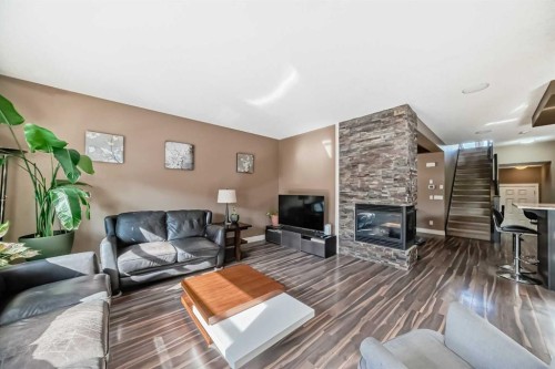 97 Auburn Glen Drive Se, Calgary, AB - Indoor Photo Showing Living Room With Fireplace