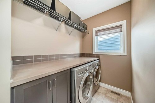 97 Auburn Glen Drive Se, Calgary, AB - Indoor Photo Showing Laundry Room