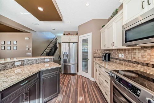 97 Auburn Glen Drive Se, Calgary, AB - Indoor Photo Showing Kitchen With Stainless Steel Kitchen With Upgraded Kitchen