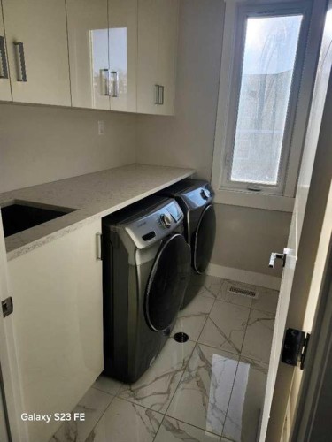 3680 26 Avenue Sw, Calgary, AB - Indoor Photo Showing Laundry Room