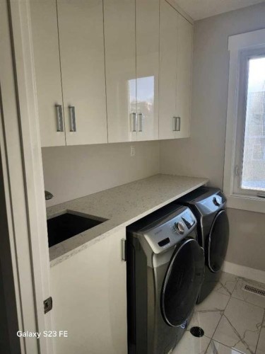 3680 26 Avenue Sw, Calgary, AB - Indoor Photo Showing Laundry Room