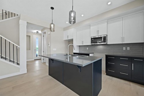 21 Sora Gate Se, Calgary, AB - Indoor Photo Showing Kitchen With Upgraded Kitchen