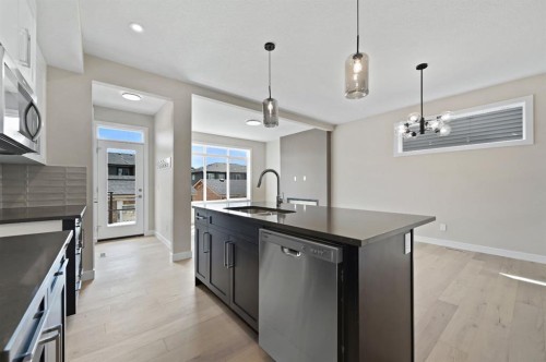 21 Sora Gate Se, Calgary, AB - Indoor Photo Showing Kitchen With Upgraded Kitchen