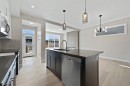 21 Sora Gate Se, Calgary, AB  - Indoor Photo Showing Kitchen With Upgraded Kitchen 