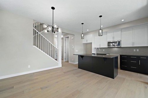 21 Sora Gate Se, Calgary, AB - Indoor Photo Showing Kitchen With Upgraded Kitchen
