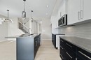 21 Sora Gate Se, Calgary, AB  - Indoor Photo Showing Kitchen With Upgraded Kitchen 