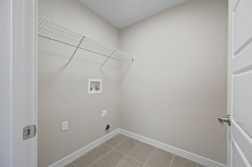 21 Sora Gate Se, Calgary, AB - Indoor Photo Showing Other Room