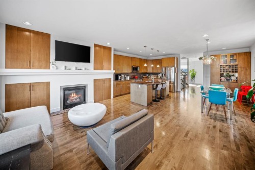 528 31 Street Nw, Calgary, AB - Indoor Photo Showing Living Room With Fireplace