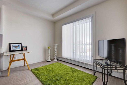 305-15233 1 Street Se, Calgary, AB - Indoor Photo Showing Other Room