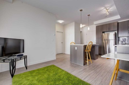305-15233 1 Street Se, Calgary, AB - Indoor Photo Showing Kitchen