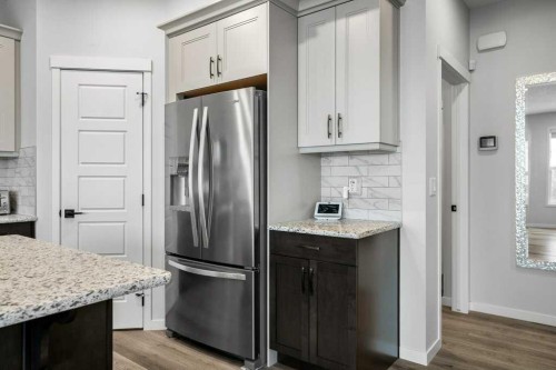 102 Creekside Way Sw, Calgary, AB - Indoor Photo Showing Kitchen With Stainless Steel Kitchen