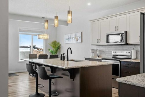 102 Creekside Way Sw, Calgary, AB - Indoor Photo Showing Kitchen With Upgraded Kitchen