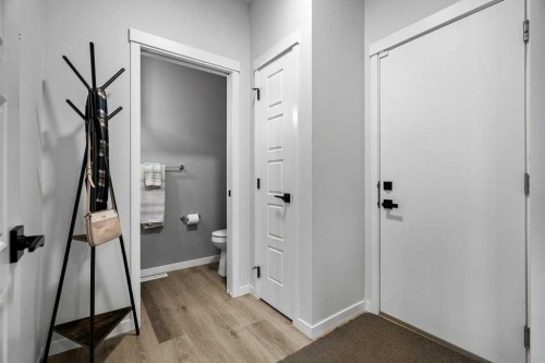 102 Creekside Way Sw, Calgary, AB - Indoor Photo Showing Other Room