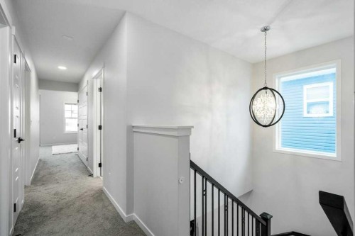 102 Creekside Way Sw, Calgary, AB - Indoor Photo Showing Other Room