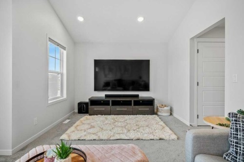 102 Creekside Way Sw, Calgary, AB - Indoor Photo Showing Living Room