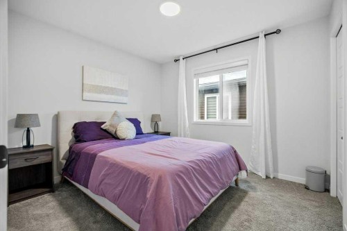 102 Creekside Way Sw, Calgary, AB - Indoor Photo Showing Bedroom