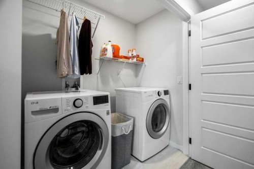 102 Creekside Way Sw, Calgary, AB - Indoor Photo Showing Laundry Room