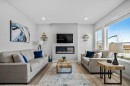 102 Creekside Way Sw, Calgary, AB  - Indoor Photo Showing Living Room With Fireplace 