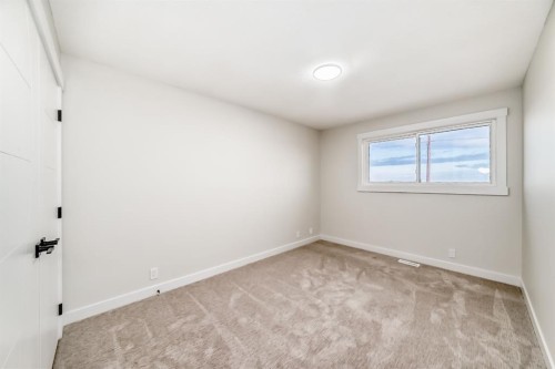 100 Beddington Circle Ne, Calgary, AB - Indoor Photo Showing Other Room