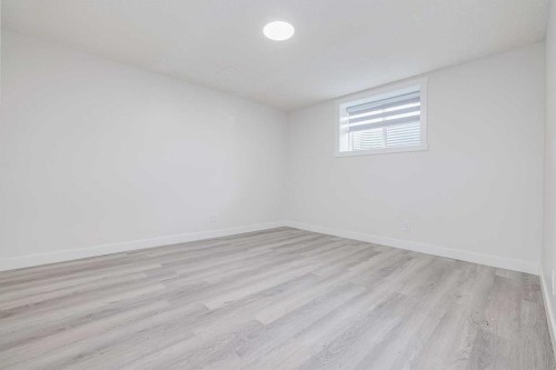 152 Falconridge Crescent Ne, Calgary, AB - Indoor Photo Showing Other Room