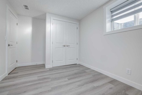 152 Falconridge Crescent Ne, Calgary, AB - Indoor Photo Showing Other Room