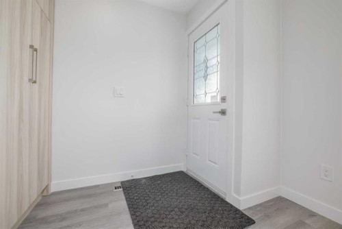 152 Falconridge Crescent Ne, Calgary, AB - Indoor Photo Showing Other Room